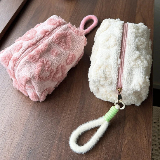 Trousse maquillage - Élégance Nori - blanc et rose claire fermées - posées sur table - rangement innovant