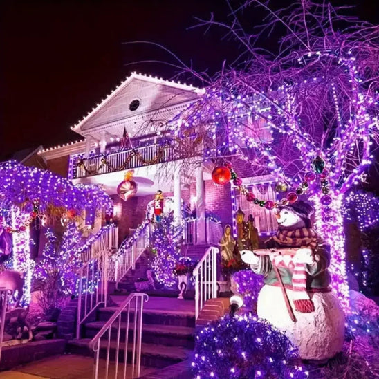 Guirlande solaire Écomagic lumière violette allumée décorations maison jardin arbres plantes