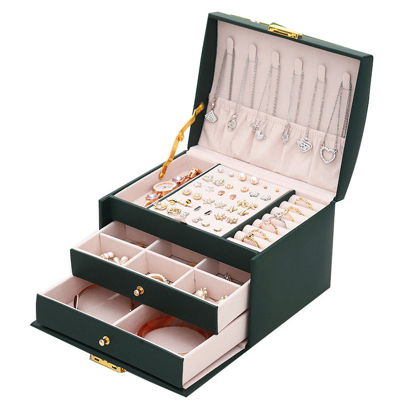 Boite-a-bijoux-prestige-rangement-innovant-vert-ouverte-remplie-de-bijoux
