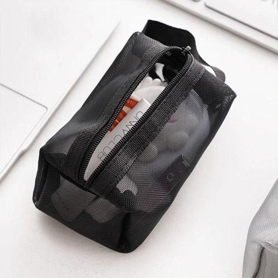 Trousse de maquillage - Élégante - noir - ouverte - rangement innovant