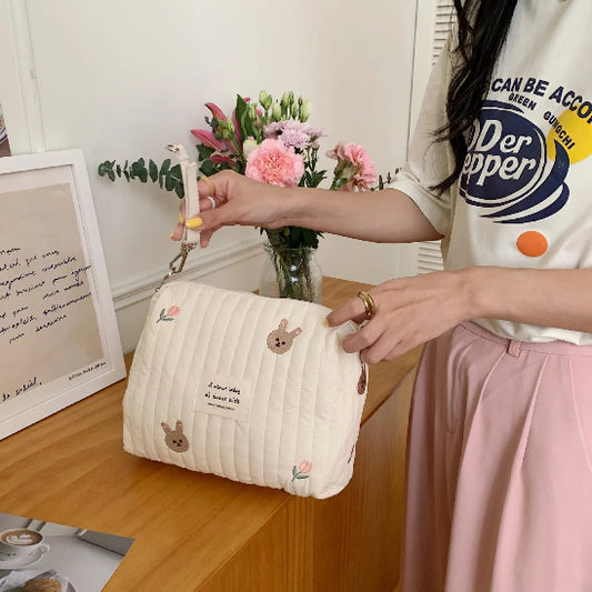 Trousse de toilette bébé - Complète et Pratique - rangement innovant - lapins - fermée