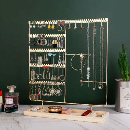 Bijoux-rangement-élégant-rangement-innovant-doré-posé-sur-une-table-en-marbre