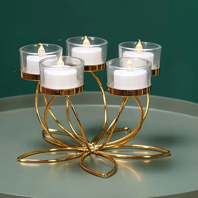 Bougeoir design cinq bougies allumées