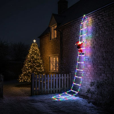 Décoration noël extérieur Féerique lumière multicolore père noël escalader mur