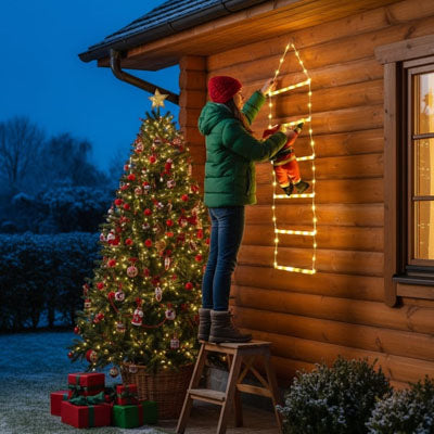 Décoration noël extérieur Féerique lumière chaude père noël escalader mur installé par jeune femme
