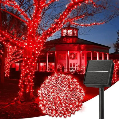 Guirlande solaire  Écomagic allumée lumière rouge décoration arbres jardin