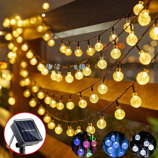 Guirlande solaire Luminéco  lumière chaude allumée décoration barrière jardin 