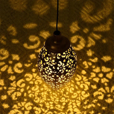 Lampe solaire décoration allumée projection motifs sur tapis