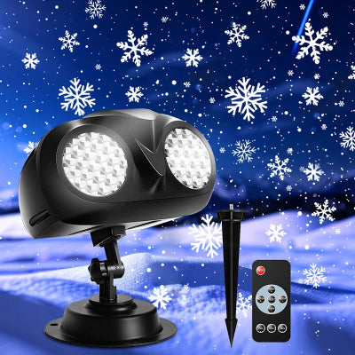PROJECTEUR LED EXTERIEUR Flocons Féériques posé sur la neige projection flocons neige ciel bleu