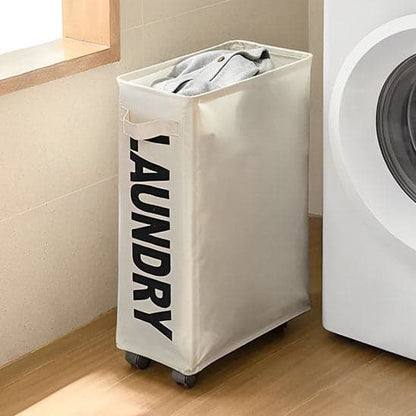 Panier-à-linge-pliable-avec-des-roulettes-rangement-innovant-posé-dans-une-buanderie-propre