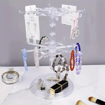 Porte bijoux  Élégant pratique transparent deux niveaux rempli de bijoux posé sur support blanc
