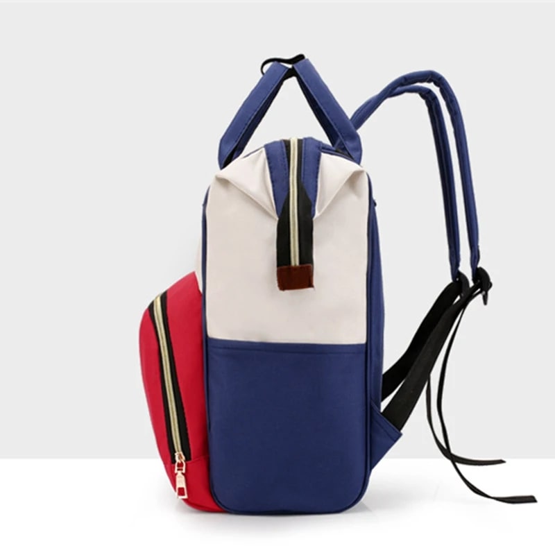 Sac-à-dos-à-langer-nori-rangement-innovant-vue-de-profil