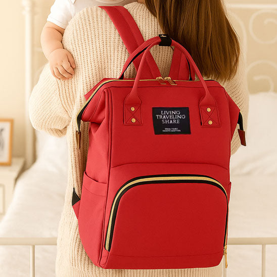 Sac-à-dos-à-langer-nori-rangement-innovant-avec-maman-et-bébé-rouge-porté-sur-le-dos