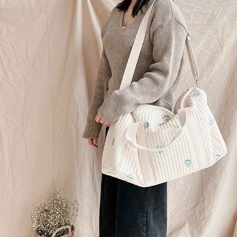 SAC-A-LANGER-BEBE-rangement-innovant-ourson-porté-à-épaule