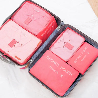 Sac de rangement  Multifonctionnel plusieurs  couleur rose rangés dans valise grise