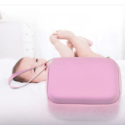 Trousse de toilette bébé rose fermée bébé souriant