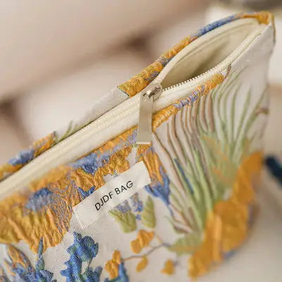 Trousse de toilette femme Florale modèle fermeture éclair blanche