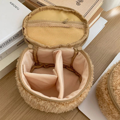 Trousse maquillage  Élégance Nomade ouverte vide posées sur le sol