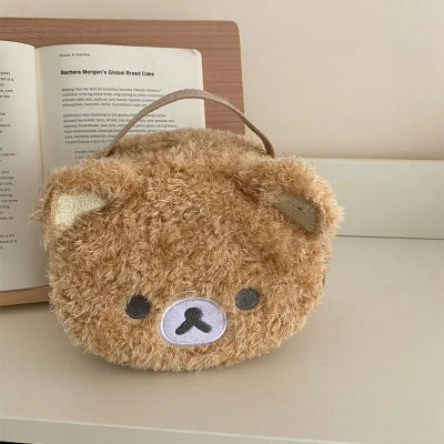 Trousse maquillage  Élégance Nomade fermée devant livre ouvert