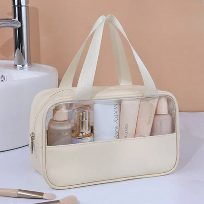 Trousse de toilette - Transparente Voyage - beige - fermée - posée sur la table - Rangement innovant