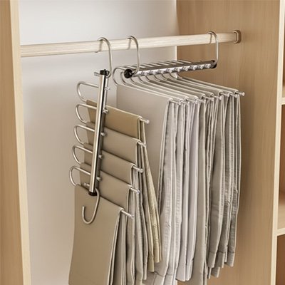 Cintre pantalon​ plusieurs rangés dans dressing