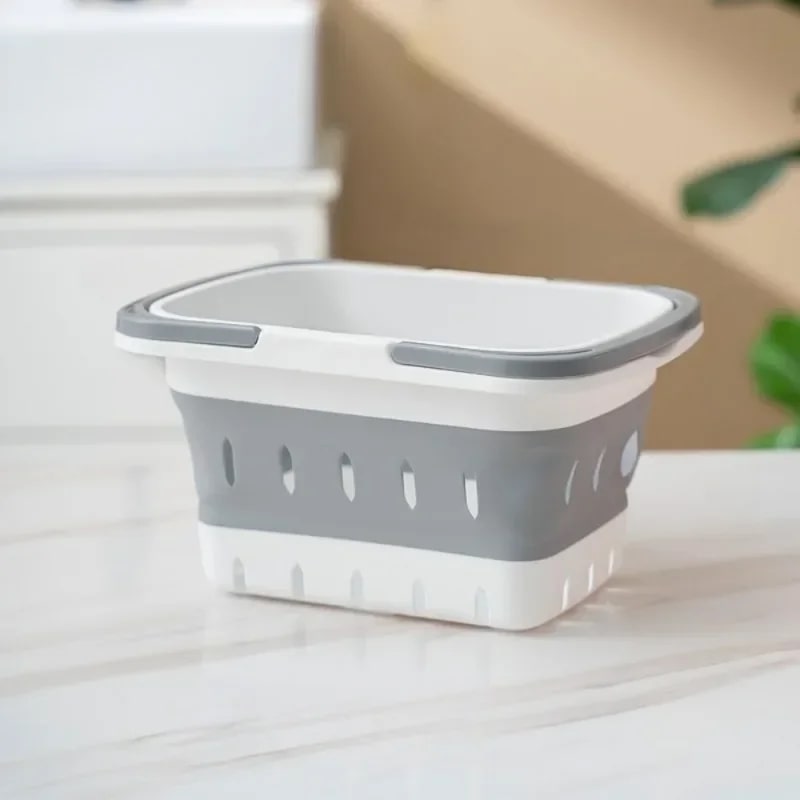Panier-à-linge-plastique-pliable-polyvalent-rangement-innovant-gris-petit-vide-posé-sur-la-table