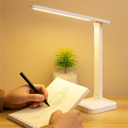 Lampe de bureau  LumiWork sur bureau éclaire dessinateur