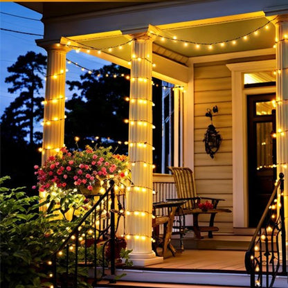 Guirlande solaire  Écomagic allumée lumière chaude décoration façade entrée devant maison