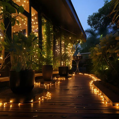 Guirlande lumineuse extérieur MagiGarden lumière chaude décoration allée bois