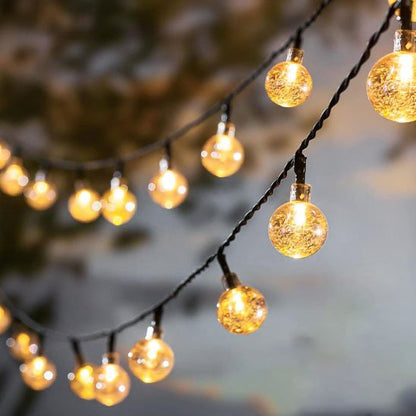 Guirlande solaire Luminéco lumière chaude allumée suspendue