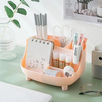 Organisateur de bureau ProEspace rose posé sur bureau vert