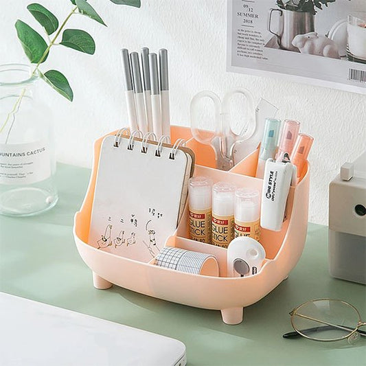 Organisateur de bureau ProEspace rose posé sur bureau vert