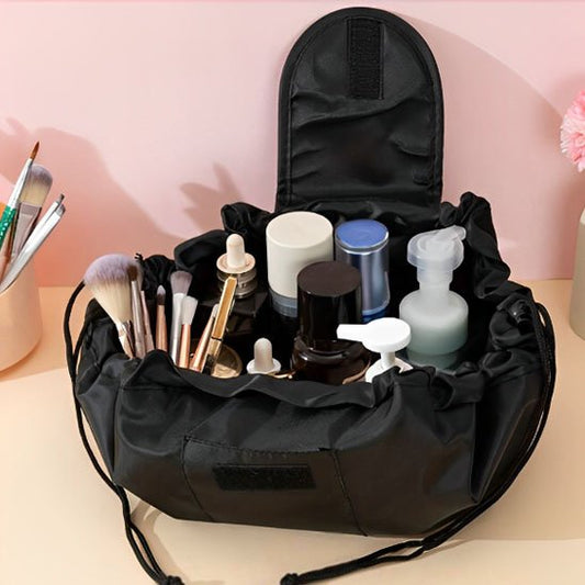 trousse maquillage pratique noir remplie de produits cosmétiques rangement innovant